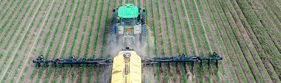 Aerial view of nitrogen sprayer on agricultural field